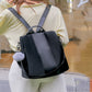 2-in-1 Backpack Shoulder Bag with Pom Pom